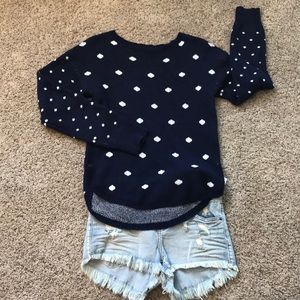 Blue sweater with white polka dots